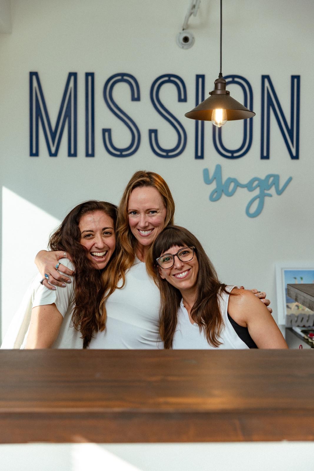 Three women at mission yoga studio